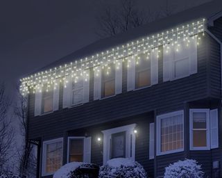 150 LED warm white faceted mini twinkling icicle Christmas lights on exterior of house