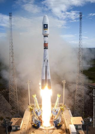 A Russian Soyuz rocket lifts off from the Guiana Space Center in Kourou, French Guiana, on a mission to deliver Europe's first two operational Galileo navigation satellites into orbit. The two satellites were ultimately deployed in the wrong orbit.