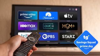 a remote pointing at a television displaying various streaming service logos with a Tom's Guide prime day badge in the bottom right corner