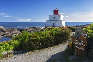 Amphitrite Point Lighthouse on Wild Pacific Hiking Trail near Ucluelet, Vancouver Island British Columbia Canada