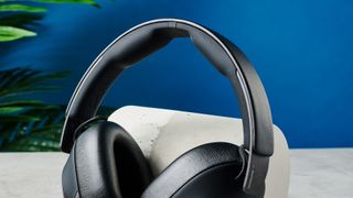 A black HP Poly Voyager Surround 80 UC wireless work-first headset