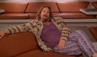 Jeff Bridges talks while relaxing on a couch in The Big Lebowski.