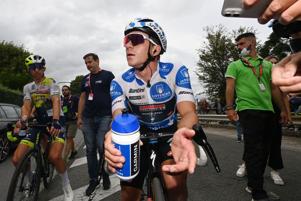 GUADARRAMA SPAIN SEPTEMBER 16 Second place winner Remco Evenepoel of Belgium and Team Soudal Quick Step Polka dot Mountain Jersey reacts after the 78th Tour of Spain 2023 Stage 20 a 2078km stage from Manzanares El Real to Guadarrama UCIWT on September 16 2023 in Guadarrama Spain Photo by Tim de WaeleGetty Images
