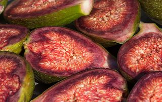 Halved fresh Brown Turkey figs