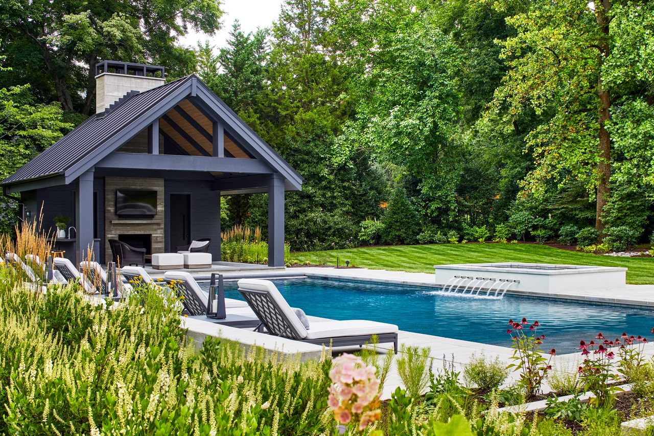 biggest gardening mistakes for the summer months; swimming pool and pool house in garden by Richardson &amp; Associates Landscape Architecture 