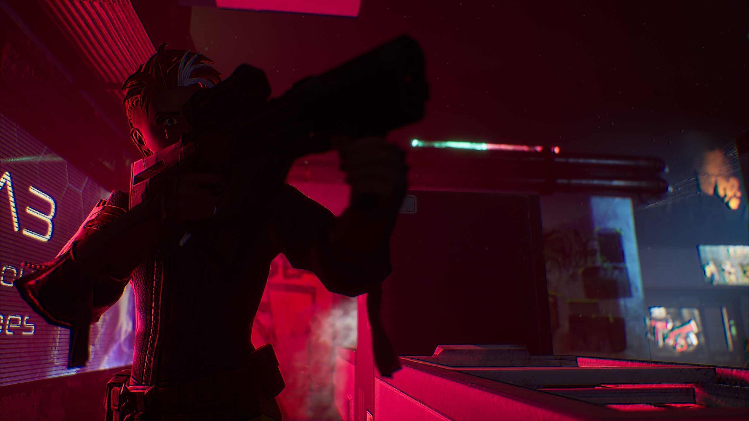 A competitor in a red room aims their gun