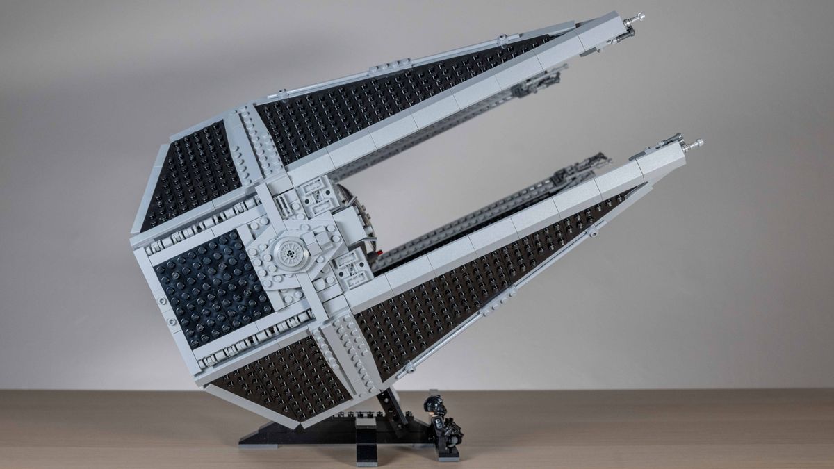 Lego TIE Interceptor, side view on a neutral background