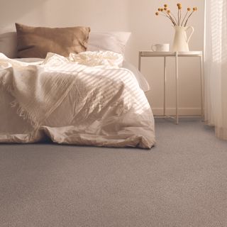 Bedroom with beige jute carpet