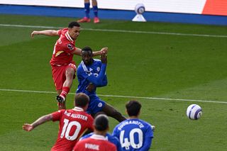 Trent Alexander-Arnold of Liverpool scores his team's first goal during the Premier League match between Leicester City FC and Liverpool FC at The King Power Stadium on April 20, 2025 in Leicester, England