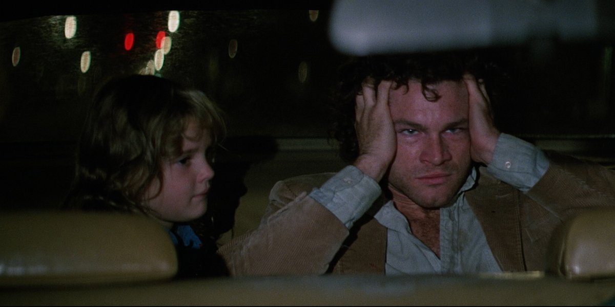 Drew Barrymore and David Keith in Firestarter