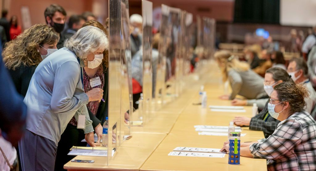 People count ballots in Wisconsin.