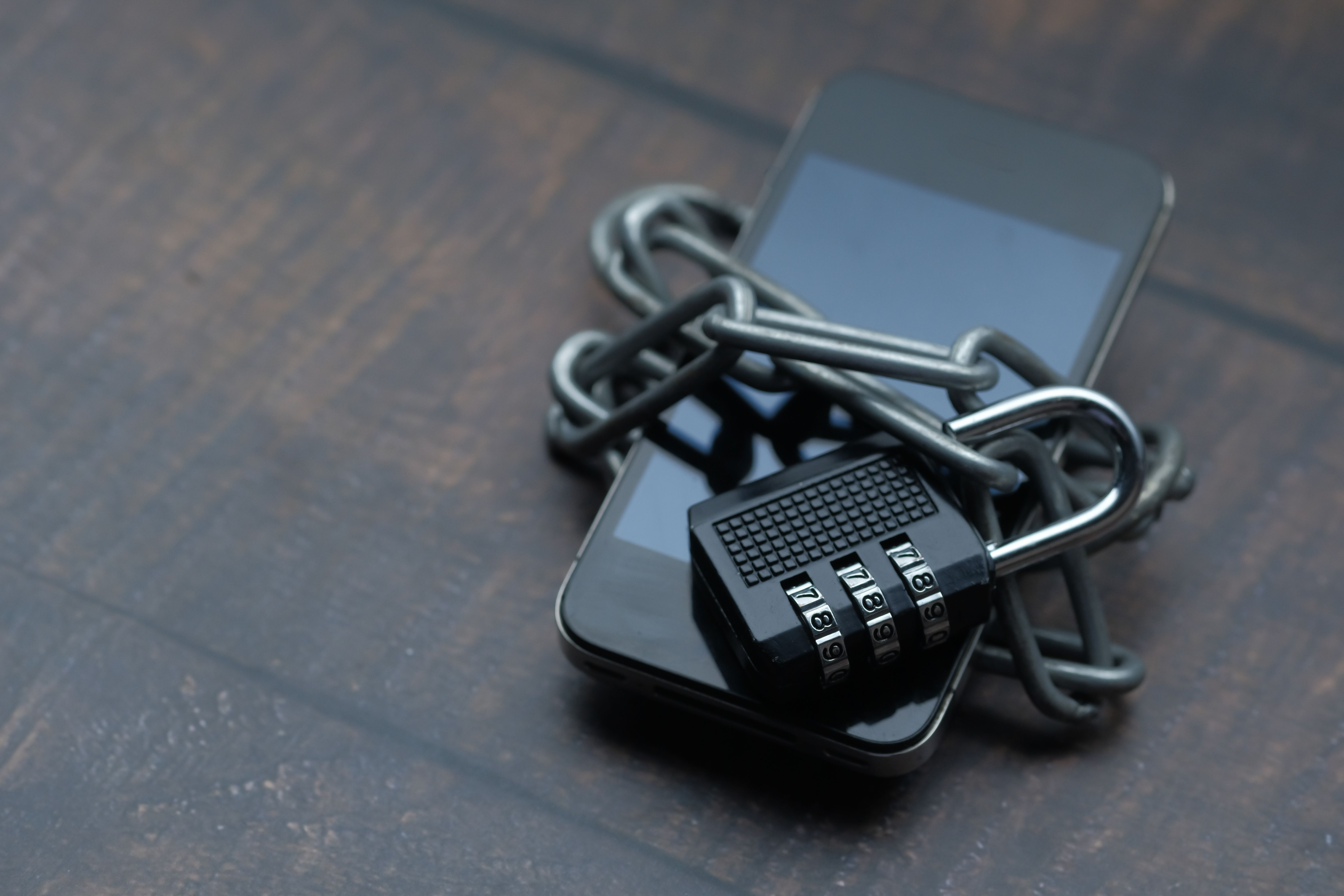 A phone wrapped in chains