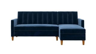 A blue velvet sectional futon