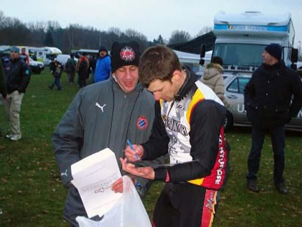Brian Matter signs his autograph for a fan.