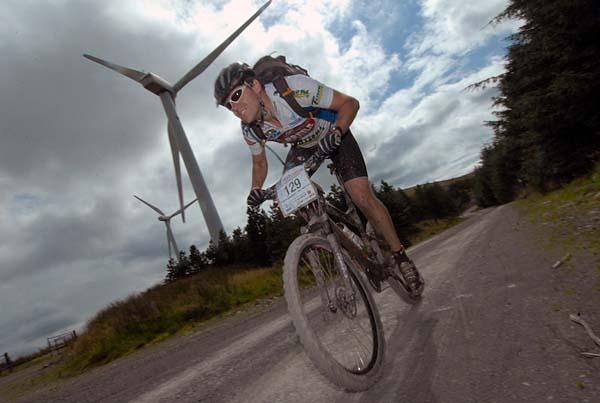 Windmills provide a backdrop.