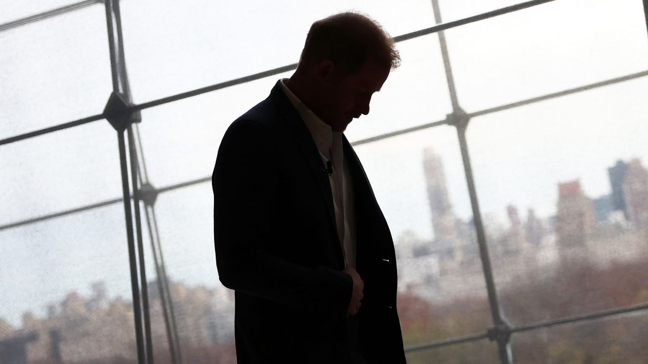 Prince Harry leaves the stage after appearing at the New York Times&#039; annual DealBook summit in December