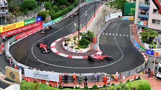 Ferrari's Monegasque driver Charles Leclerc (R), Ferrari's Spanish driver Carlos Sainz Jr (L), Red Bull Racing's Mexican driver Sergio Perez (2L) and Red Bull Racing's Dutch driver Max Verstappen (rear) compete in the Monaco Formula 1 Grand Prix at the Monaco street circuit 