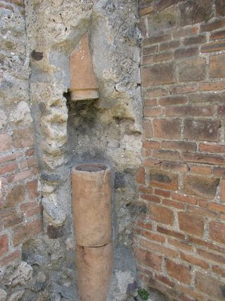 Vertical downpipe in Pompeii
