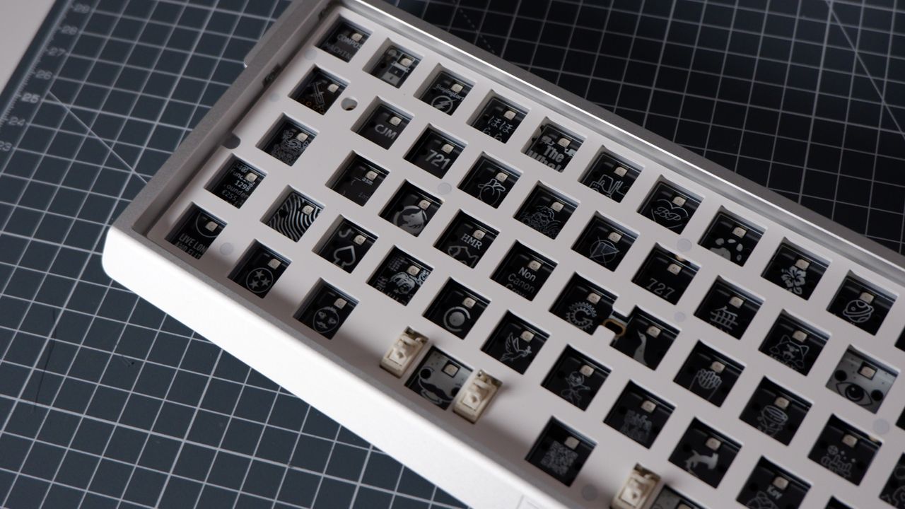 The Wooting 60HE v2 at various stages of being built.