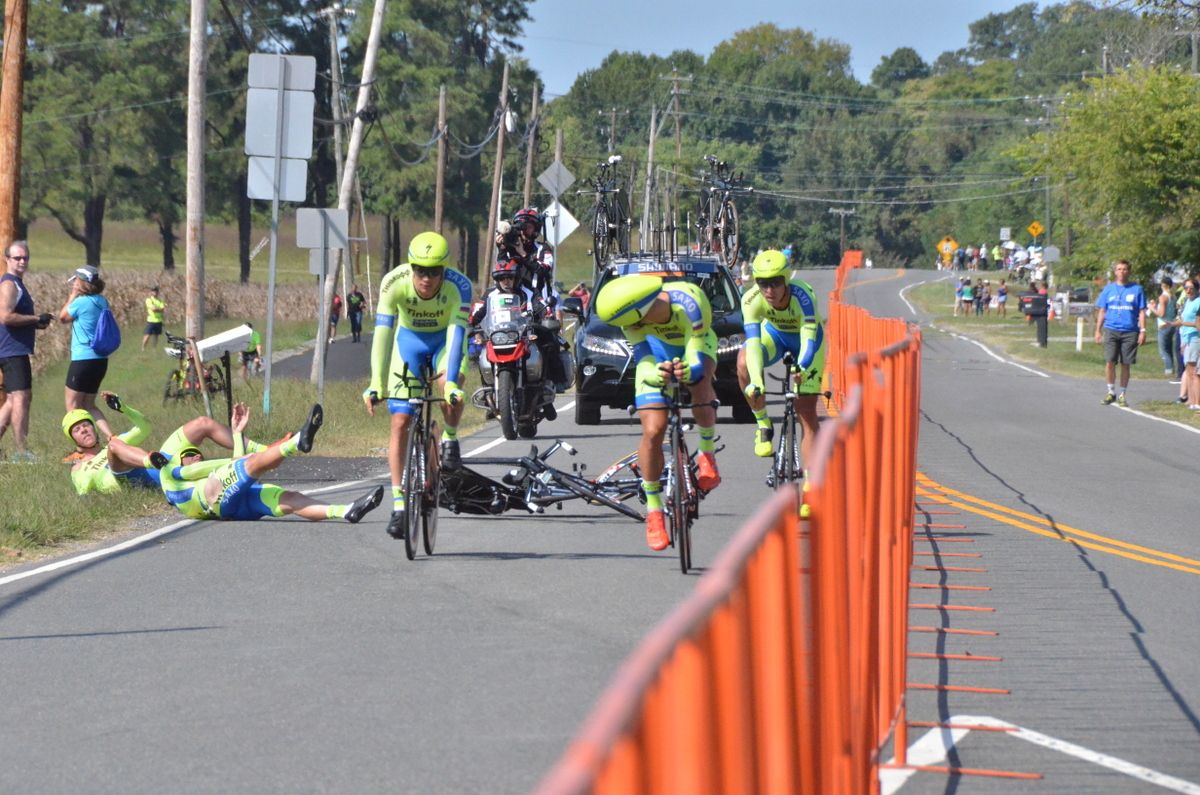 Michael Rogers and Michael Valgren roll off the road after crashing as Peter Sagan looks back