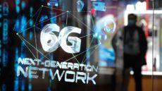 A hologram showing a 6G network concept on display at the 4th China International Import Expo (CIIE) in Shanghai, China