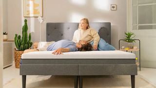 A couple on the Emma Original mattress in a bedroom