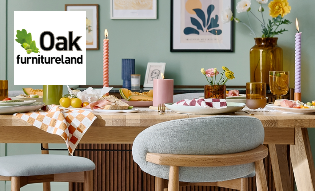 Dining room table with summer coloured crockery and candles