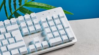 A white Razer Pro Type Ultra mechanical productivity keyboard