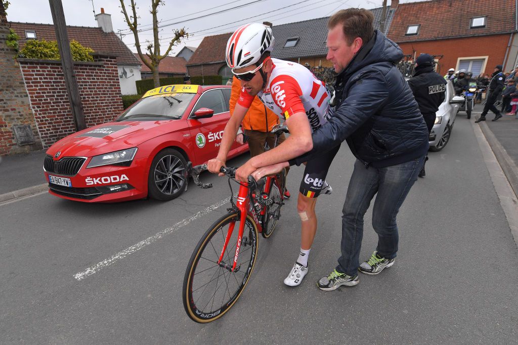 Tiesj Benoot crashed before later abandoning after hitting a Jumbo-Visma team car