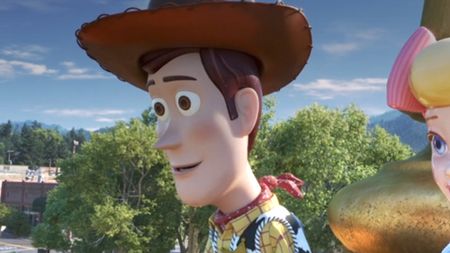 Woody sitting outside at the fair in Toy Story 4