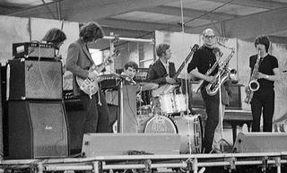 English blues singer, songwriter and musician John Mayall performs live on stage with the Bluesbreakers at the Barn Barbecue Concert & Dance at Whittlesey near Peterborough in England on 2nd June 1968. From left to right, John Mayall, Mick Taylor, Jon Hiseman, Tony Reeves, Dick Heckstall-Smith and Chris Mercer.