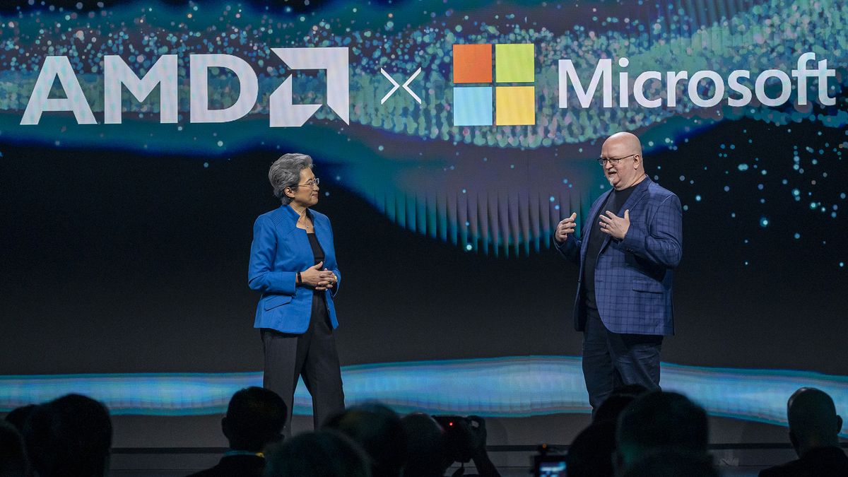 Lisa Su, president and CEO of AMD and Kevin Scott, executive vice president of AI and CTO of Microsoft, standing together on stage at the AMD Advancing AI event in December 2023