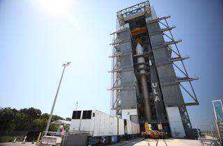 The United Launch Alliance Atlas V rocket that will launch the next X-37B mission stands stacked at Florida's Cape Canaveral Air Force Station.