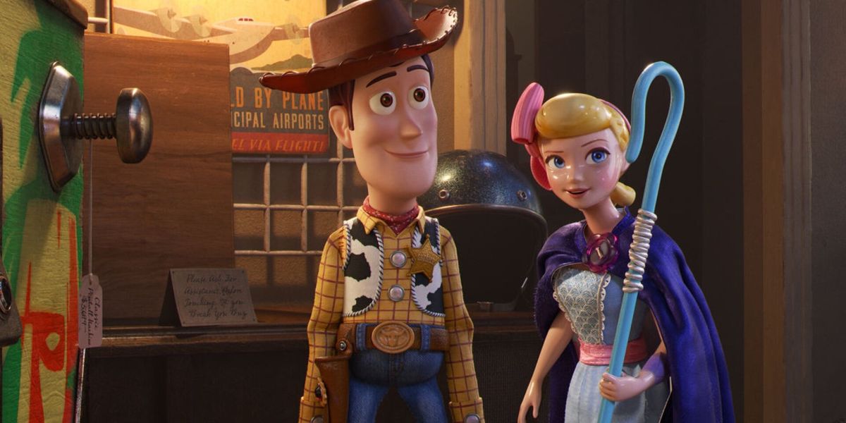 Toy Story 4 Woody and Bo Peep smiling together in the antique store