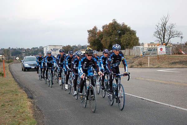 Armstrong and Basso approaching the climb.