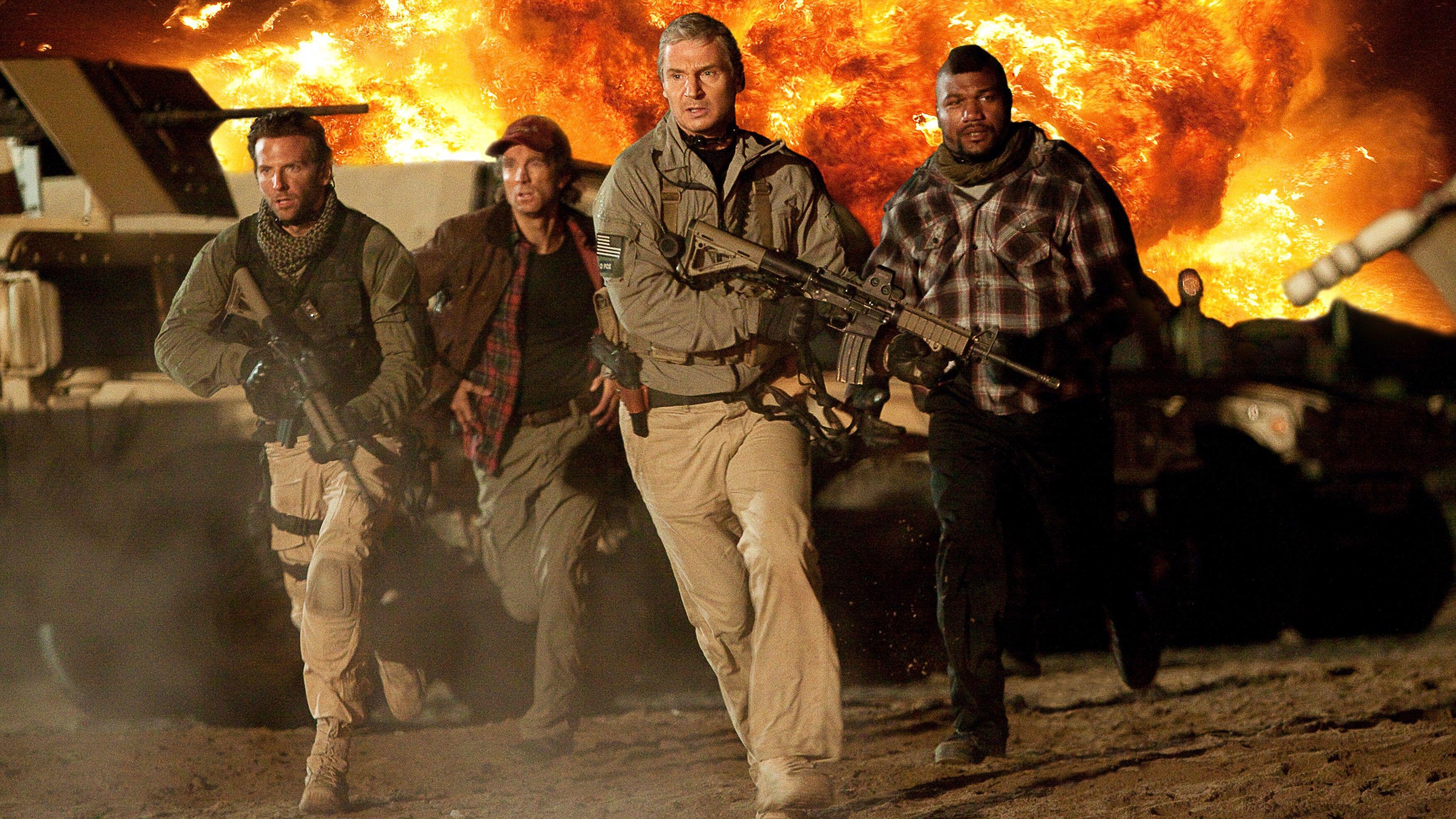 L-R: Bradley Cooper, Sharlto Copley, Liam Nesson and Quinton Jackson run from an explosion in &quot;The A-Team&quot; (2010)