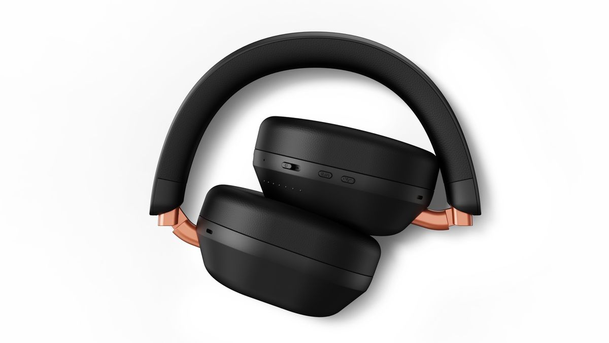 Fidelio L5 headphones on a dark blue background, or folded