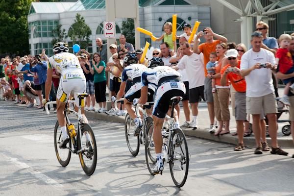 Fans cheer one of the breaks after passing through the start/finish area.