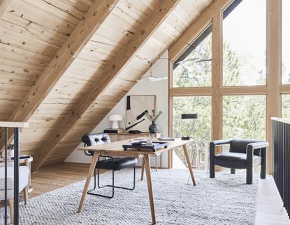 A loft space with office furniture