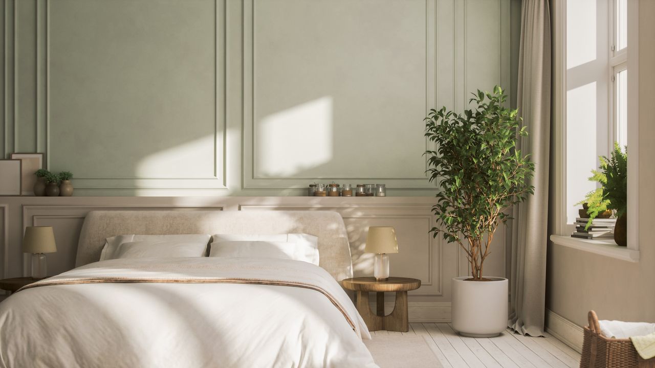 Modern, elegant bedroom with panelling in calming neutral tones with houseplants and potted tree