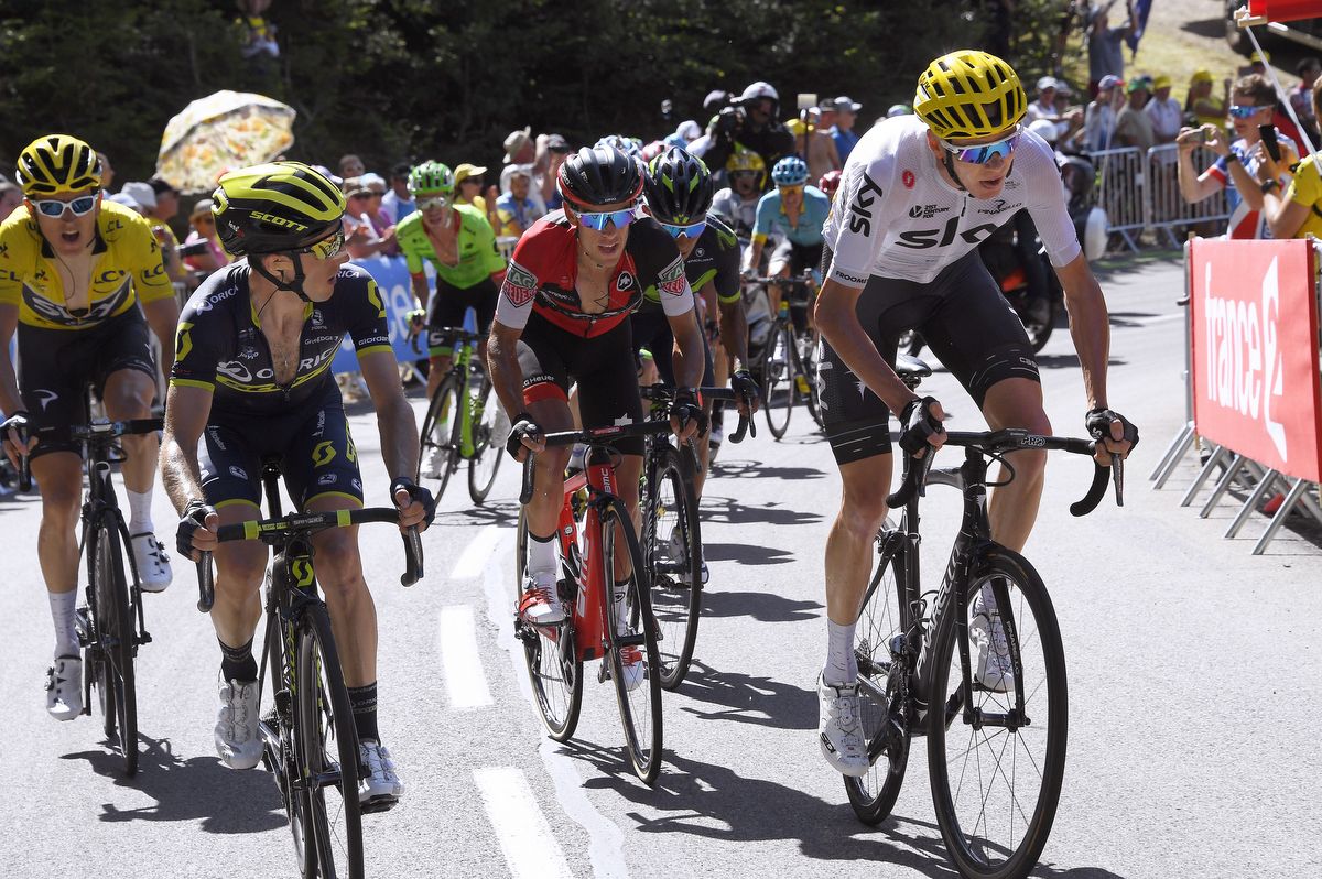 Simon Yates (Orica-Scott) looks accros as Chris Froome makes his move