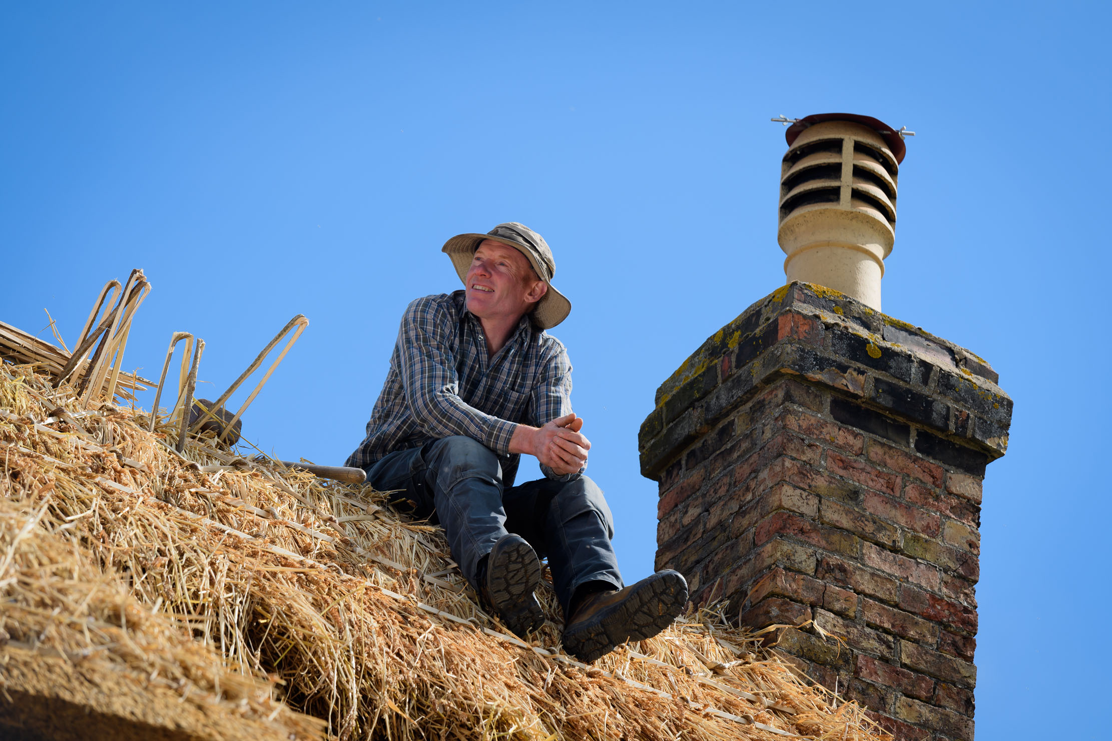 Stuart Dodson, Master Thatcher, at Treetop cottage, West Perry, near Huntingdon.