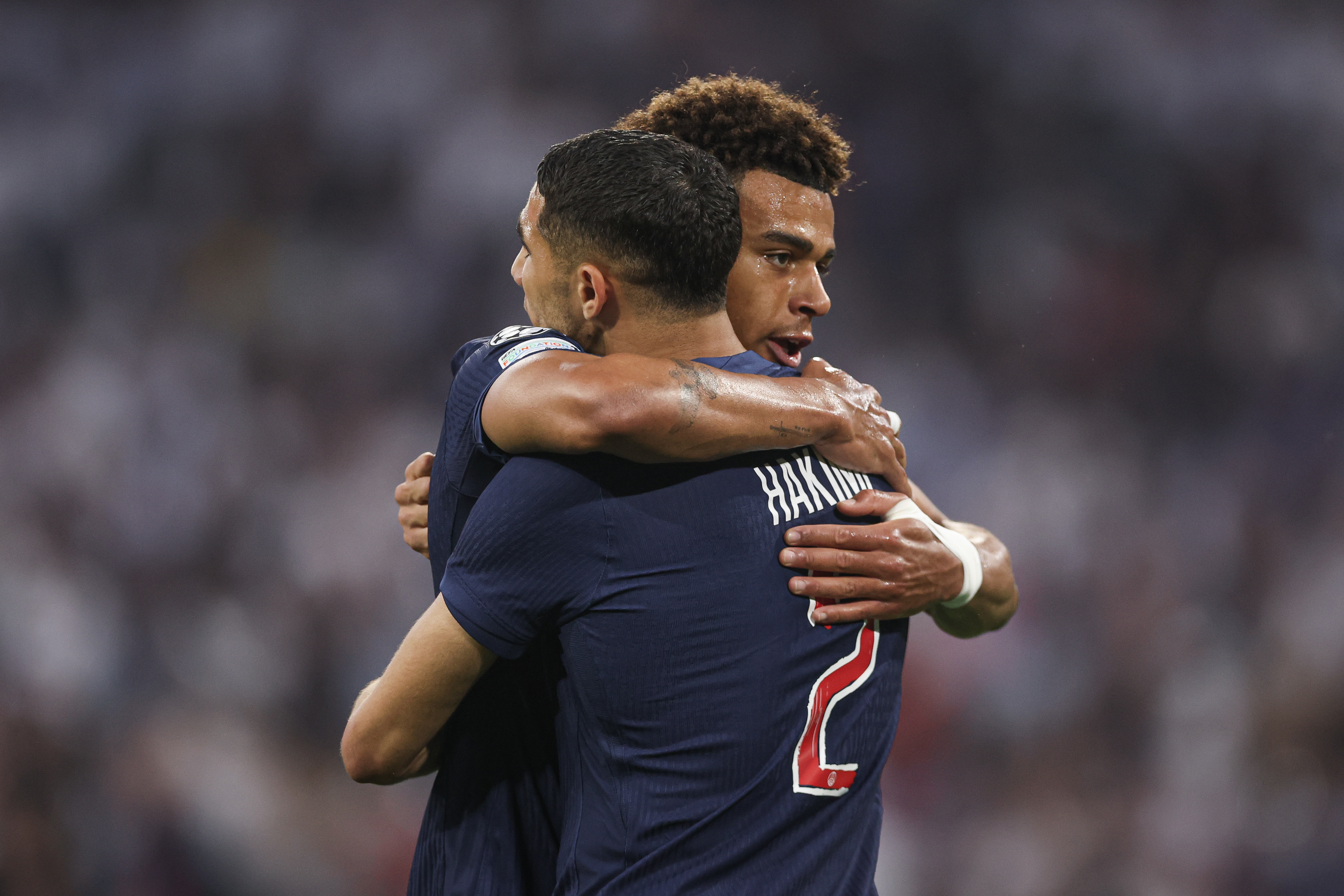 Achraf Hakimi celebrates with Desire Doue after scoring Paris Saint-Germain's first goal against Inter in the Champions League final in May 2025.
