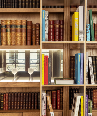 styled wooden bookshelf with square shelving