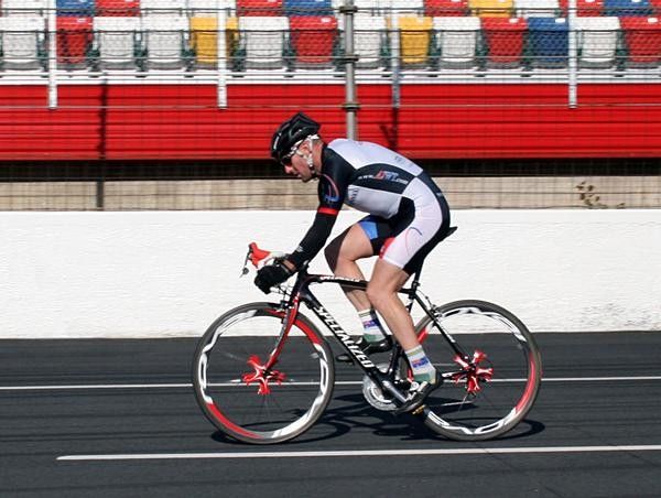 Nathan rides the Tarmac road bike on the drops with road helmet.