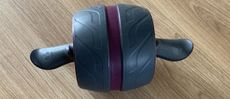 Perfect Fitness Ab Carver Pro model on wooden floor