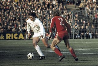 Dieter Muller (left) in action for FC Koln against Bayern Munich in February 1975.