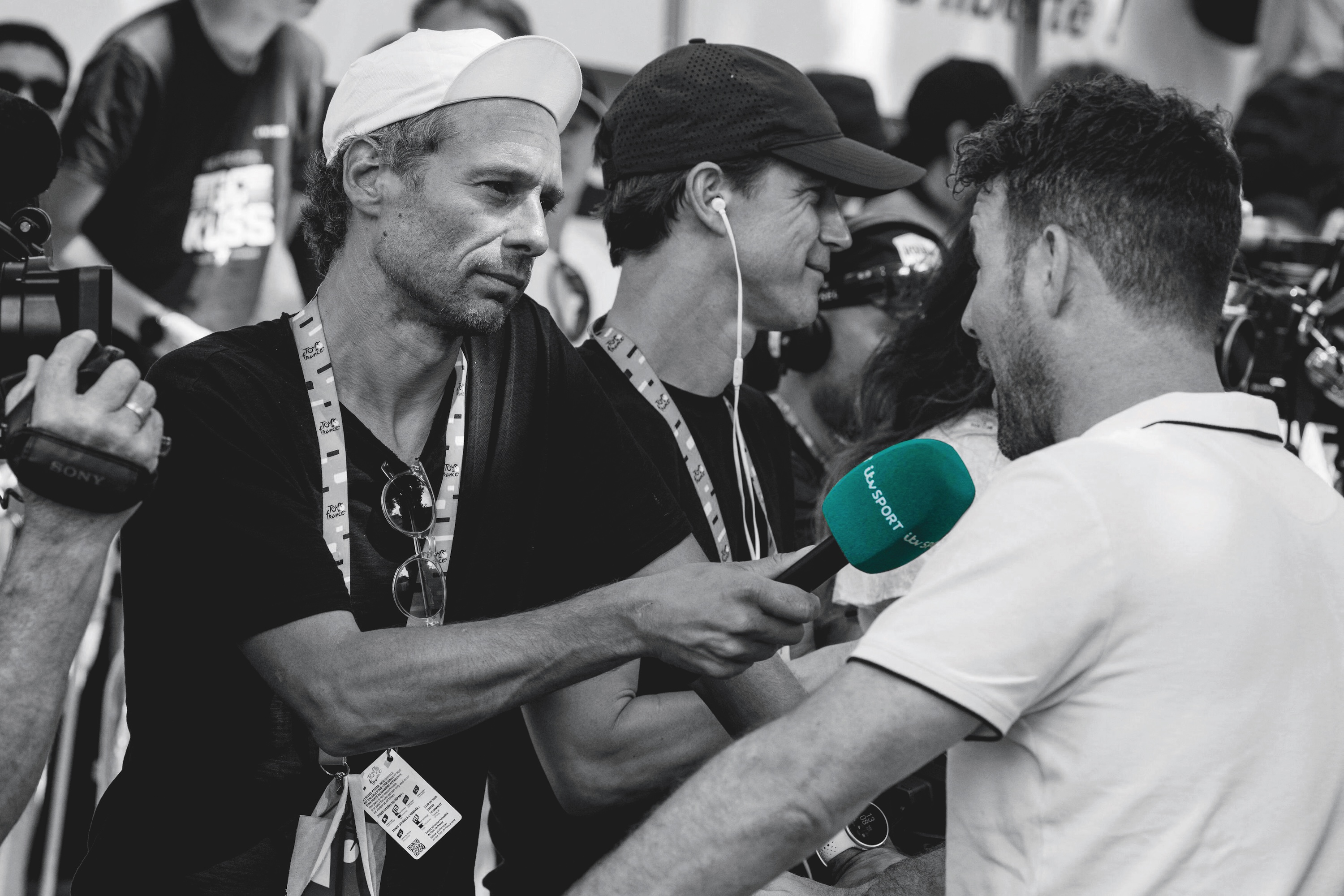 Daniel Friebe, a man with a microphone, interviews Mark Cavendish