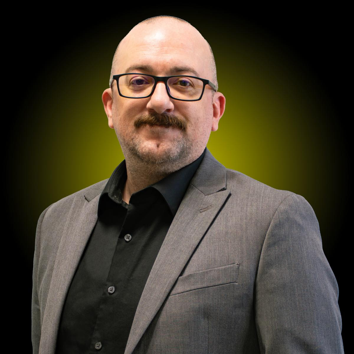 Headshot of Adam Grede.