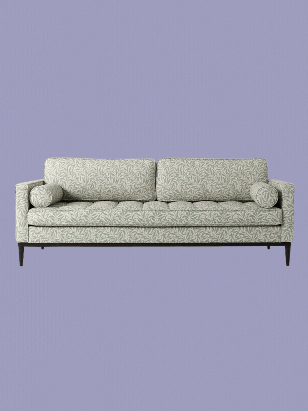 A GIF of a foliage patterned three-seater sofa from Swyft x Morris &amp;amp; Co.